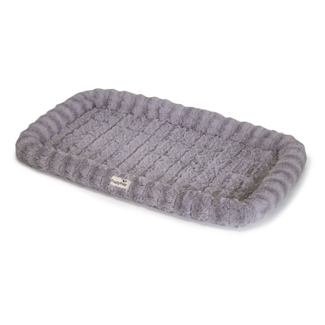 TrustyPup Kennel Luxe Deluxe Crate Cushion for Medium Dogs in grey, featuring a plush padded perimeter bolster and soft quilted center for comfort and protection, sized 28.5 by 18 by 3 inches, machine washable and suitable for medium dog crates or as a cozy resting pad outside the crate.