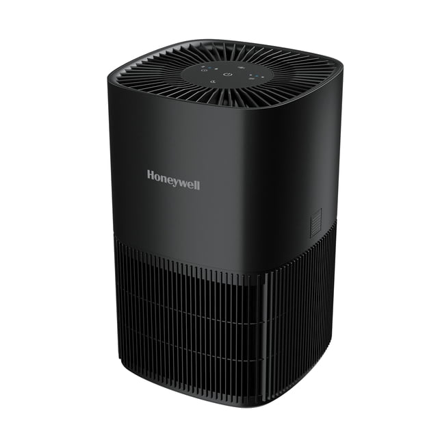 HONEYWELL HEPA AIR PURIFIER de Table Noir HPA120BC avec un Corps Rectangulaire Noir Mat et des Coins Arrondis, des Évents d'Admission d'Air Verticaux sur la Moitié Inférieure, et un Panneau Supérieur avec Pales de Ventilateur Circulaires et Commandes Tactiles, Conçu pour une purification Efficace de l'Air HEPA dans les Petites à Moyennes Pièces.