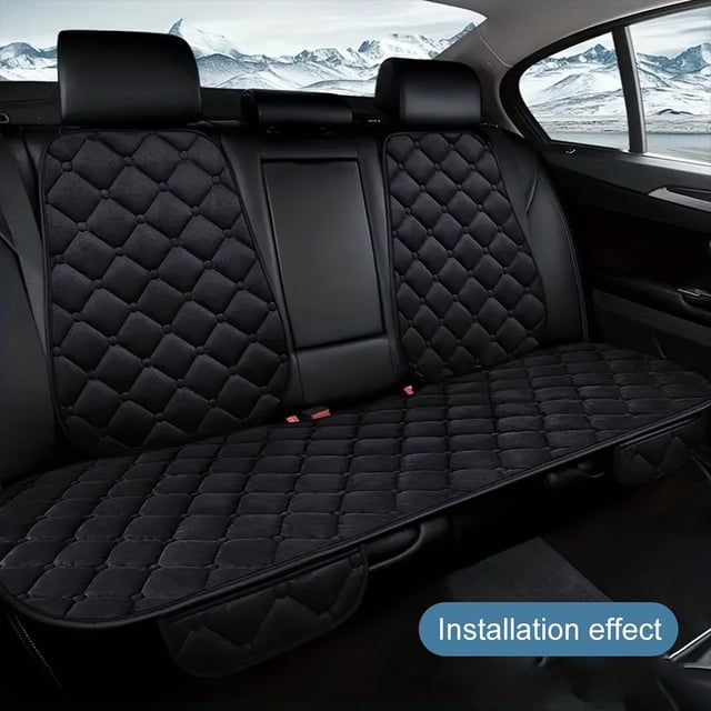 Car Back Seat Cover Plush Material Rear Back Row Protector Mat, Auto Chair Cushion shown installed on the rear seats of a car. The cover features a quilted design in a dark color, made of high-quality plush material for a soft and comfortable feel. Designed to protect the car's interior from spills and stains, it fits most cars, trucks, and SUVs. The breathable design ensures air circulation, and the easy-to-install straps allow for quick setup.