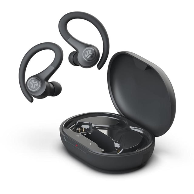 JLab Audio Go Air Sport True Wireless Earbuds in graphite with ergonomic earhooks and gel tips, shown with open compact charging case with LED indicator, featuring IP55 sweat resistance and dual connect for independent use, suitable for sports and active use.