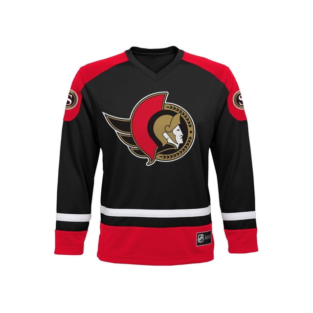 Boys NHL Team Jersey in black and red polyester mesh with embroidered Ottawa Senators logo on front and sleeves, V-neck collar, white stripe accents on sleeves and waist, and sewn NHL jock tag on lower front, designed for youth sizes S/M and L/XL.
