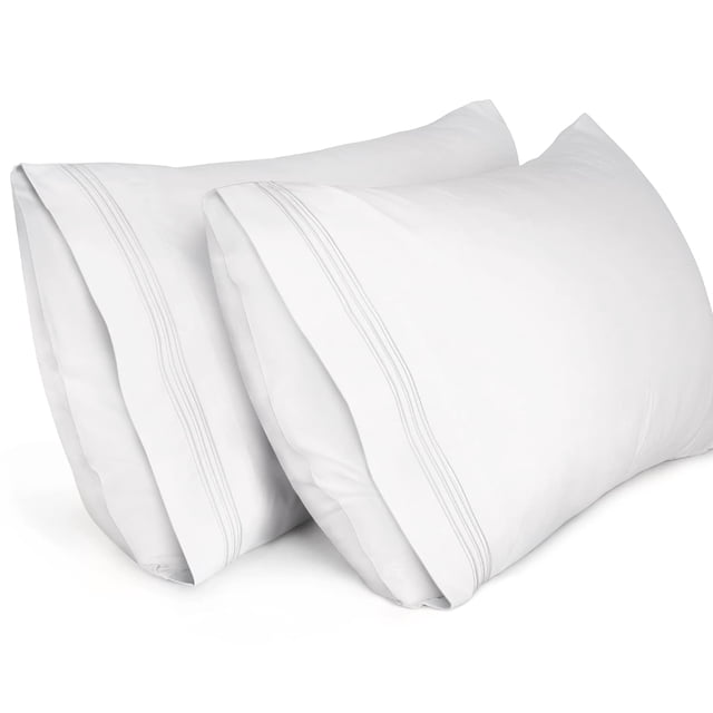 Lirex Pillow Cases 2-pack in standard size, made from 1800 thread count brushed microfiber in white. These pillowcases feature delicate embroidery and a solid design, offering a soft and durable texture. Each measures 20 inches by 26 inches (50 cm by 66 cm) and fits standard pillows. Ideal for adults, they are wrinkle-free, machine washable, and complement various bedroom décors.