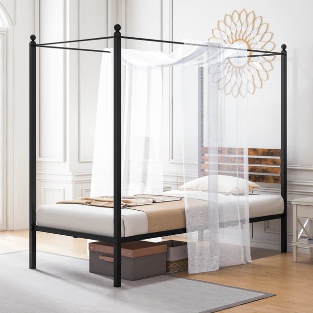 Gymax Twin Size 4-Post Canopy Bed Frame, rustproof metal and noise-free design, featuring decorative ball caps and a rustic brown slatted headboard. Includes protective foot pads and 12 inches of under-bed storage space. Displayed in a bright bedroom with sheer curtains draped over the canopy.