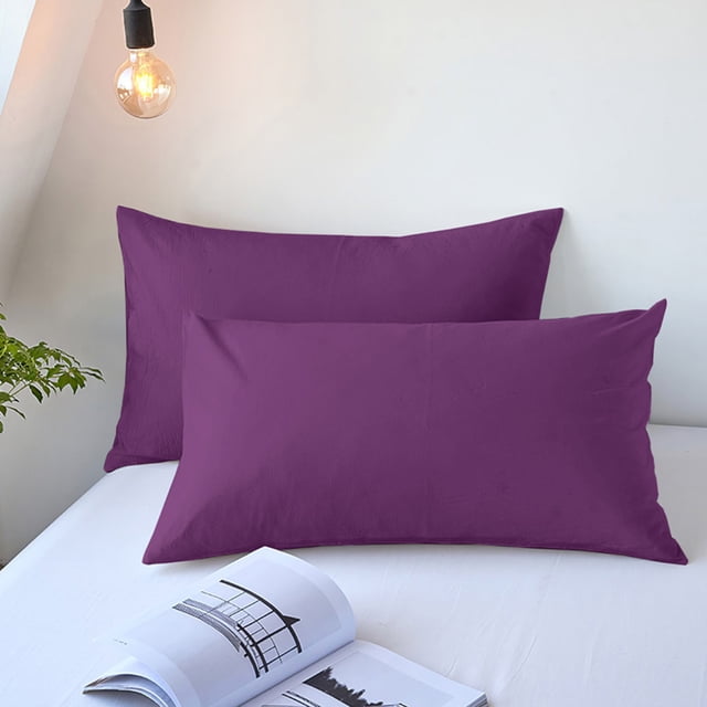 Staron Cooling Pillow Cases Queen Size Set of 2 in purple, displayed on a white bed. These all-season breathable pillowcases are made of polyester with a velvety texture, designed for hot sleepers to regulate temperature and reduce night sweats. Featuring an envelope closure for a secure fit, each pillowcase measures 48x74cm (18.90x29.13in).
