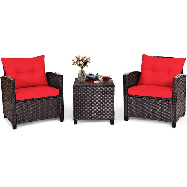Giantex 3 Pieces Patio Furniture Set featuring two PE rattan wicker chairs with red washable cushions and a tempered glass-top table. The set is designed for outdoor use in gardens, poolside, balconies, or patios. The chairs have wide armrests and ergonomic backrests for comfort, while the table provides a sturdy surface for drinks or decor. The rattan is weather-resistant, and the cushions have removable covers for easy cleaning.