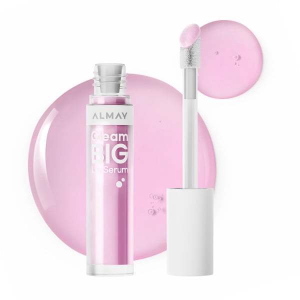 Almay Gleam Big Lip Serum 200 Lavender Dreams in a clear tube with light pink serum, white cap, and plush applicator wand coated with serum, shown with pink serum droplets, delivering hydration and high-impact shine for fuller, healthier lips with a sheer wash of colour.