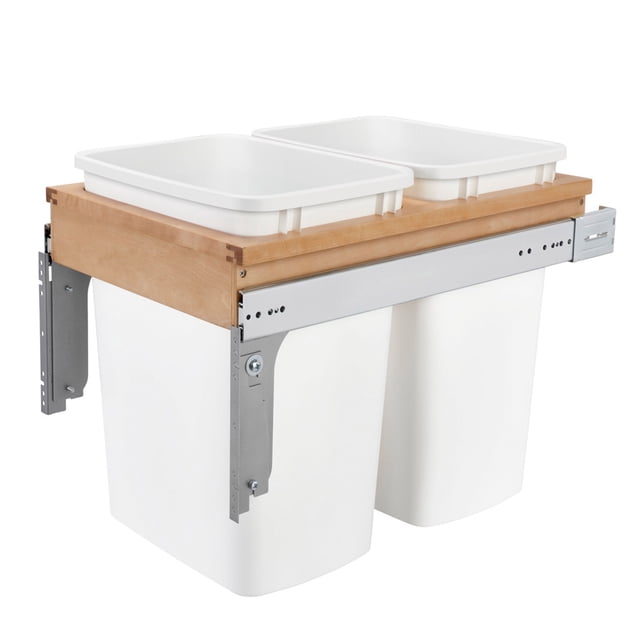 Rev-A-Shelf Top Mount Double Pullout Under Cabinet Trash Can, 35 Qt, with two white 35-quart bins mounted on a maple wood frame featuring dovetail construction. Includes full-extension ball-bearing slides and adjustable door mount brackets for seamless installation in 15-inch cabinet openings. Ideal for hidden waste storage and efficient kitchen organization.