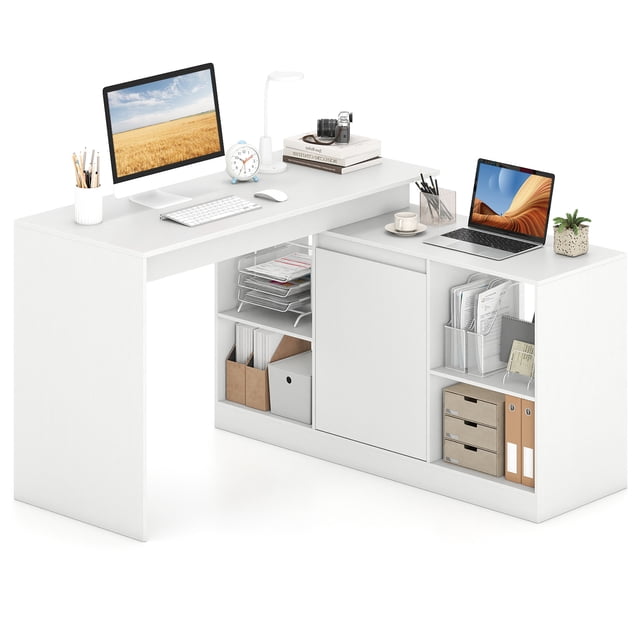 Gymax Bureau d'Ordinateur en L Réversible de 48 Pieds' en Blanc, Comprenant un Grand Plateau, 2 Portes Fermées et 4 cubes de Rangement Ouverts. le Bureau Est Présenté dans un Cadre Lumineux et Minimaliste avec des Fournitures de Bureau, un Portable et un Moniteur Posés à la surface. la Conception Réversible Permet de Positionner l'Armoire des Deux Côtés, Maximisant l'Espace dans les Coins. Fait de Bois d'Ingénierie et de Métal, Il Comprend des supports Renforcés et des Patins Antidérapants pour la Stabilité.