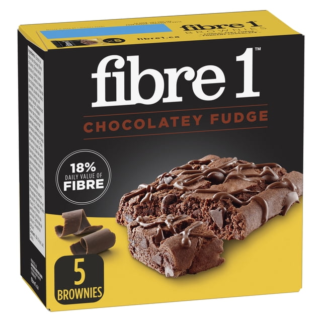 Fibre 1 Brownies Chocolatey Fudge box containing five chocolatey fudge brownies with chocolate drizzle and curls, providing 18% daily fibre value, ideal as an everyday dessert cake or bakery snack.