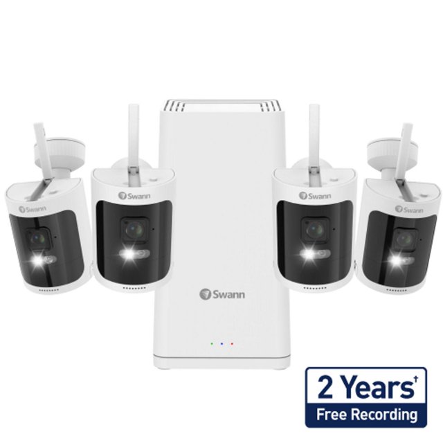 Swann AllSecure650 Wi-Fi NVR PowerHub 2K Wireless Security Kit with 4 wire-free, weatherproof cameras with antennas and LED lights, paired with a white Power Hub featuring ventilation slots, delivering 2K video, motion-sensing alerts, and up to 2 years of video storage for dependable outdoor security.