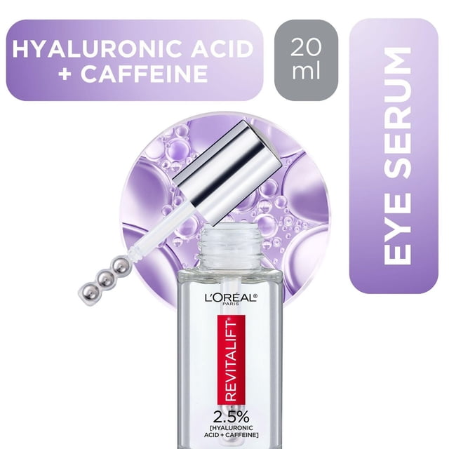 L'Oréal Paris Eye Serum Hyaluronic Acid + Caffeine 20 ml clear glass bottle with silver triple roller applicator dropper, shown with purple bubble background, featuring 2.5% hyaluronic acid and caffeine to hydrate, brighten, and depuff the eye area.