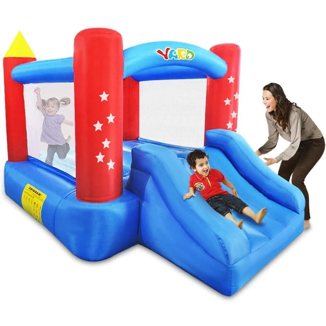 YARD Star Bouncer Bounce House Slide Inflatable Castle Jumper with Blower, featuring a multicolour design with red, blue, and yellow accents. The inflatable measures 9.5 feet in length, 6.6 feet in width, and 6.6 feet in height when fully inflated. It includes a slide, mesh safety netting, and star patterns on the pillars. Suitable for up to 3 children with a maximum weight capacity of 250 pounds. The image shows a child sliding down while another bounces inside, with an adult supervising nearby. Ideal for outdoor or indoor use, such as in backyards or living rooms, for events like birthday parties or family gatherings.