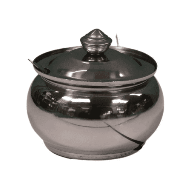 Verka Stainless Steel Ghee/Oil Pot with a polished, reflective stainless steel rounded body, fitted lid with knob handle, and small serving spoon in the lid notch, designed for hygienic storage and serving of ghee or cooking oils in the kitchen.