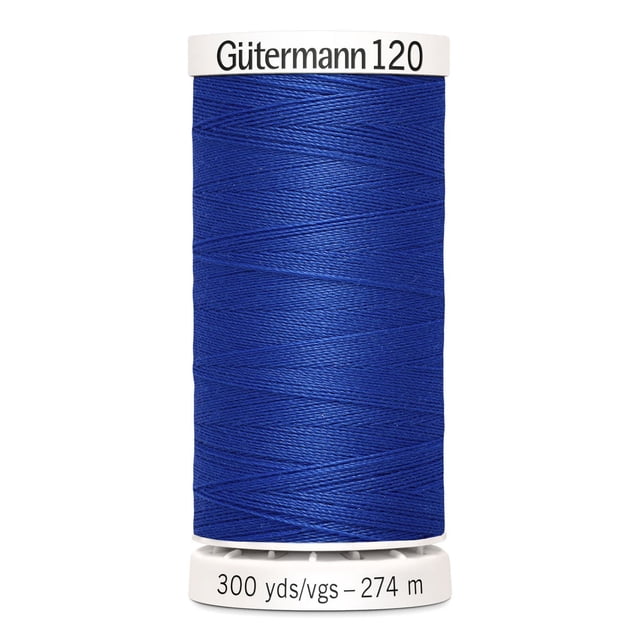 Gutermann 120 100% polyester all purpose thread spool in royal blue tightly wound on a white plastic spool labeled with 300 yards (274 meters), suitable for machine and hand sewing various fabrics including cotton, synthetics, and wool, also ideal for craft and DIY projects.