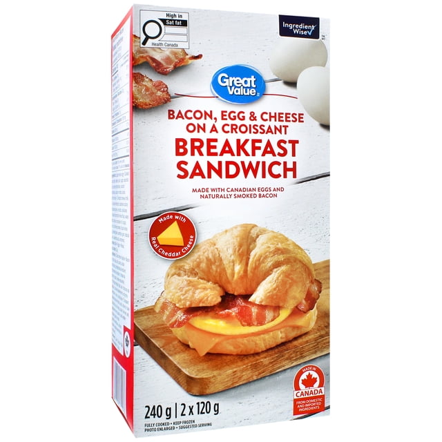 Great Value Bacon, Egg & Cheese on a Croissant Breakfast Sandwich box showing a 3/4 front view of a frozen breakfast sandwich with bacon, folded egg, and cheddar cheese on a croissant, weighing 240 g and made with Canadian ingredients.
