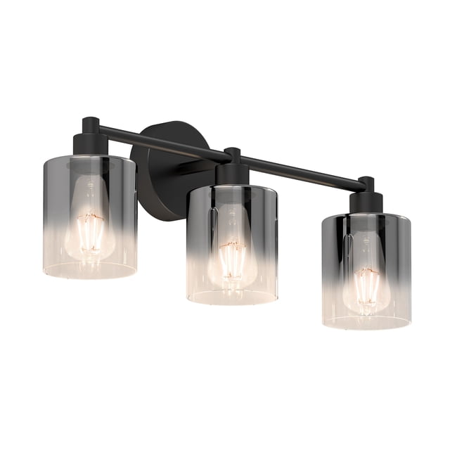 Artika Haze Modern 3-Light Bathroom Vanity Light in black glass with a sleek matte black finish and smoked chrome gradient glass diffusers. The fixture features three cylindrical glass shades revealing Edison-style bulbs inside, mounted on a horizontal bar with a circular backplate. Designed for installation above mirrors, it provides balanced illumination ideal for grooming tasks. Compatible with E26 or ST59 LED bulbs, this light combines energy efficiency with a contemporary aesthetic.