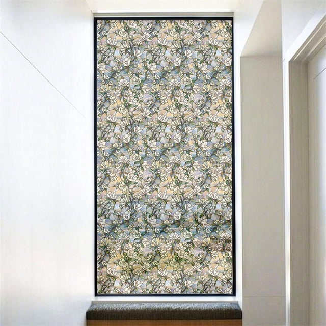 Elodie Privacy Window Glass Film Sticker with a 3D rainbow effect pattern, offering privacy while allowing natural light to pass through. Made from durable PVC material, it measures approximately 120x58cm and is shown applied to a glass window in a modern interior. The static cling design ensures easy installation and removal without residue, ideal for home or office use.