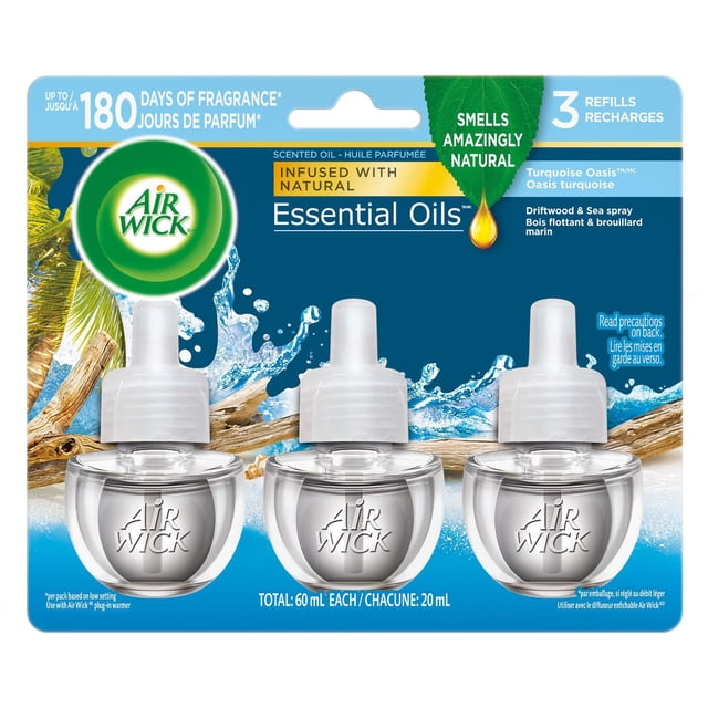 Air Wick Plug In Scented Oil refills, 3 pack, Turquoise Oasis scent with driftwood and sea spray, each 20mL clear rounded bottle with white cap, infused with natural essential oils, providing up to 180 days of fragrance, ideal for freshening air in living spaces.