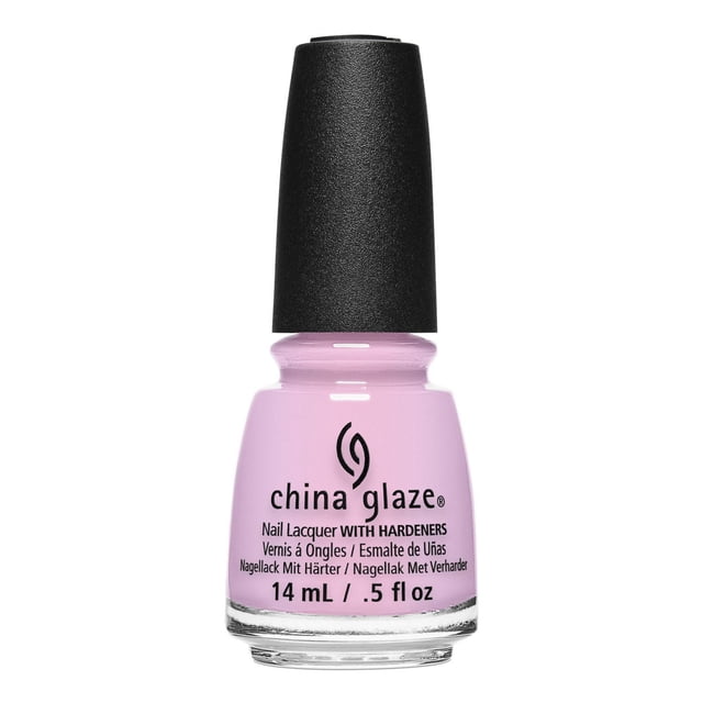 China Glaze Nail Lacquer - Wanderlust - 0.5 FL OZ bottle with light pink nail polish and black textured cap, featuring a brush with 36% more fibres for precise, chip-resistant application, ideal for long-lasting nail care and polish wear.