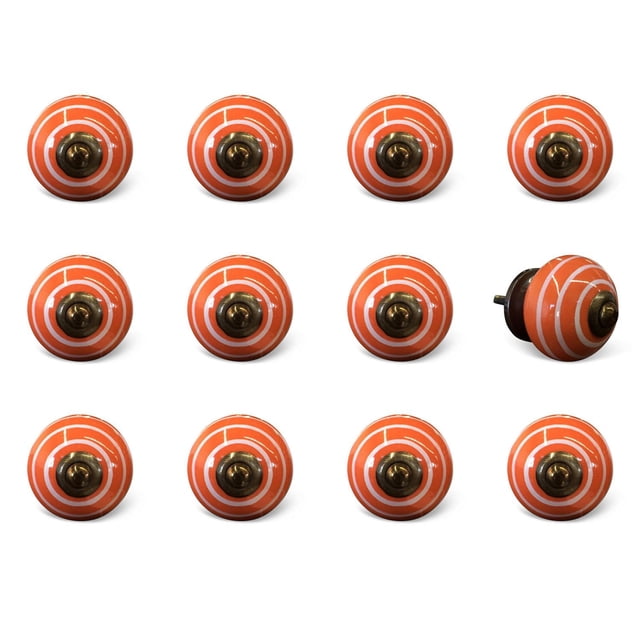 KNOB-IT VINTAGE HANDPAINTED CERAMIC KNOBS (12-Pack) KI1234 featuring twelve orange ceramic cabinet knobs with white concentric circles and antique brass bolt centers, 1.5-inch diameter with 1.25-inch bolts that can be trimmed, ideal for updating cabinets, drawers, and cupboards, arranged in a grid on a white background, also suitable for decorative furniture hardware upgrades.