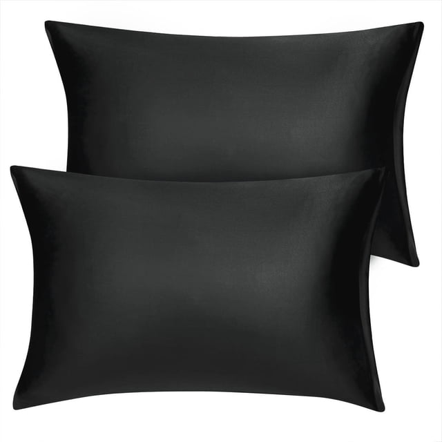 Unique Bargains Satin Pillowcase Zippered Silky Sateen in black, featuring a smooth and glossy finish. These luxury pillowcases are designed with a hidden zipper closure to securely hold pillows in place, making them ideal for bedding. Perfect for protecting hair and skin, they reduce friction, prevent sleep creases, and maintain moisture. Sold as a set of two, suitable for standard-sized pillows. Often used for maintaining hairstyles and eyelash extensions overnight.
