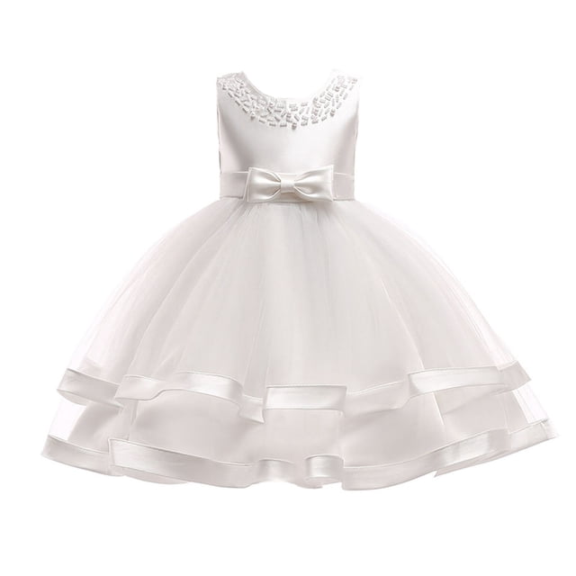 Robes pour Filles Robe Formelle pour Filles Robes Blanches pour Filles Robe de Mariage pour Filles Tenue pour la Journée des Enfants pour Filles Mode pour Filles. une Robe Formelle Blanche Sans Manches pour Filles avec une Encolure Ronde Ornée de Délicats Ornements, un Nœud en satin à la Taille et une Jupe en tulle à Étages avec Garniture en satin. Convient aux Mariages, Fêtes, Anniversaires et Autres occasions Spéciales.