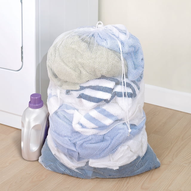 Mainstays Laundry Bag with Carry Handle – 24”W x 36”H made of breathable white mesh with reinforced rings, filled with assorted laundry, placed on a light wood floor next to a white detergent bottle with purple cap in a laundry room, ideal for organizing and transporting laundry.