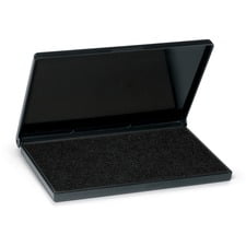 STAMP PAD BLACK Trodat replacement ink pad, centered close-up of a rectangular black water-based non-toxic ink surface seated in a plastic tray with textured edges; described for office stamp pad replacement and craft marking, often used to refresh hand stamps.