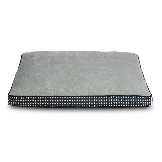 Vibrant Life Deluxe Gusset Pet Bed, Blue Diamond, rectangular dog bed measuring 42 by 32 inches with a soft grey sleeping surface and black gusseted sides featuring a white diamond pattern, filled with plush polyester fiber for comfort, and a removable, machine-washable cover ideal for large dogs and medium dogs who like to sprawl.