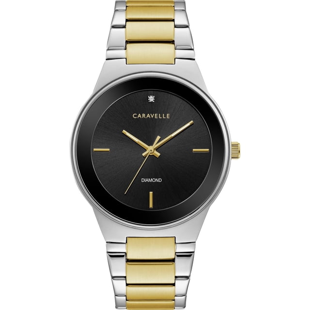Caravelle Mens Two-Tone Quartz Watch with a 40mm gold-tone accented stainless steel case and bracelet featuring brushed gold and polished silver links, a matte black dial with minimalist gold hour markers, a single diamond at 12 o'clock, water resistant up to 30m, and a double-press fold-over closure, ideal for both everyday wear and formal occasions.