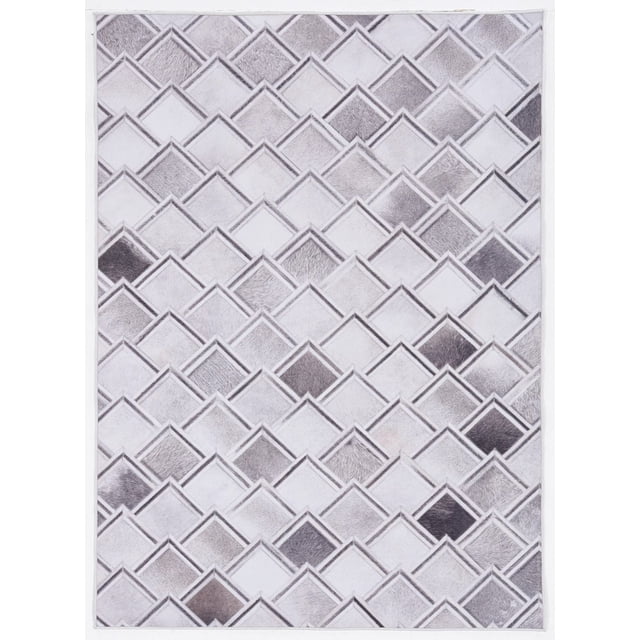 Laredo Fortin Grey & Ivory 5' x 7' area rug with a digitally printed low pile patchwork cowhide pattern in grey and ivory tones, featuring geometric diamond shapes, serged edges, and a felt backing with rubber gripper dots to prevent slipping, ideal for small rooms or defining spaces.