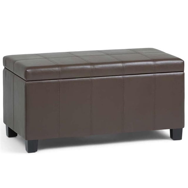 Simpli Home Dover Faux Leather Storage Bench in Chocolate Brown. This rectangular bench features a contemporary design with stitched detailing, a lift-up lid, and a spacious interior storage compartment. Constructed with solid wood, engineered wood, and high-density foam, it is sturdy and durable. The bench includes a child safety hinge to prevent lid slamming and can be used as an entryway bench, footstool, or additional seating in various rooms. Dimensions: 18.11 inches high, 35.83 inches wide, and 18.11 inches deep. Simple assembly required.