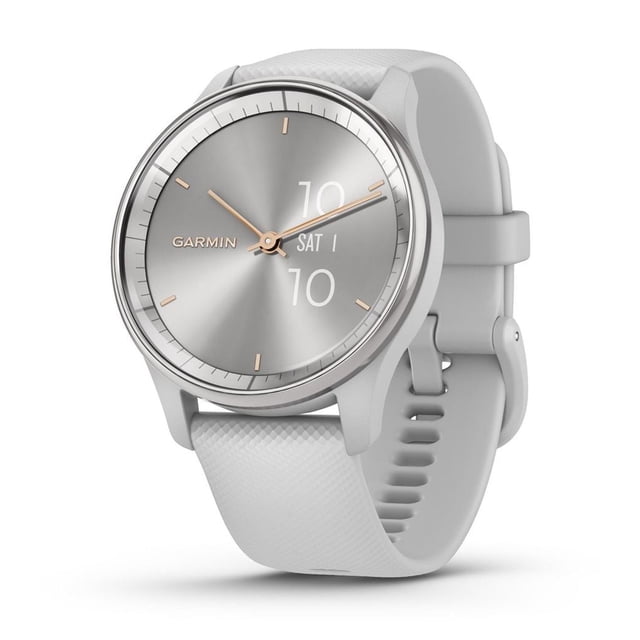Garmin vívomove® Trend Hybrid Smartwatch with a 40 mm silver stainless steel bezel and light grey textured silicone strap, featuring analog rose gold hands over a hidden touchscreen display showing date and time, offering health tracking and smart notifications compatible with iPhone and Android.
