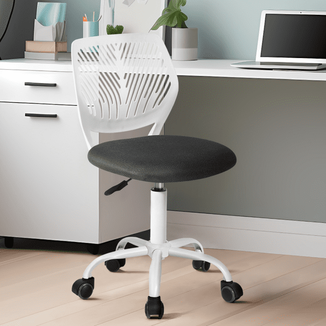 Homy Casa Boys' Girls' Swivel Study Chair with Pink Fabric Seat and Adjustable Height with white ergonomic leaf-cut backrest, soft pink fabric seat, white rolling base with five caster wheels, and height adjustment lever, suitable for ergonomic support in office furniture setups.