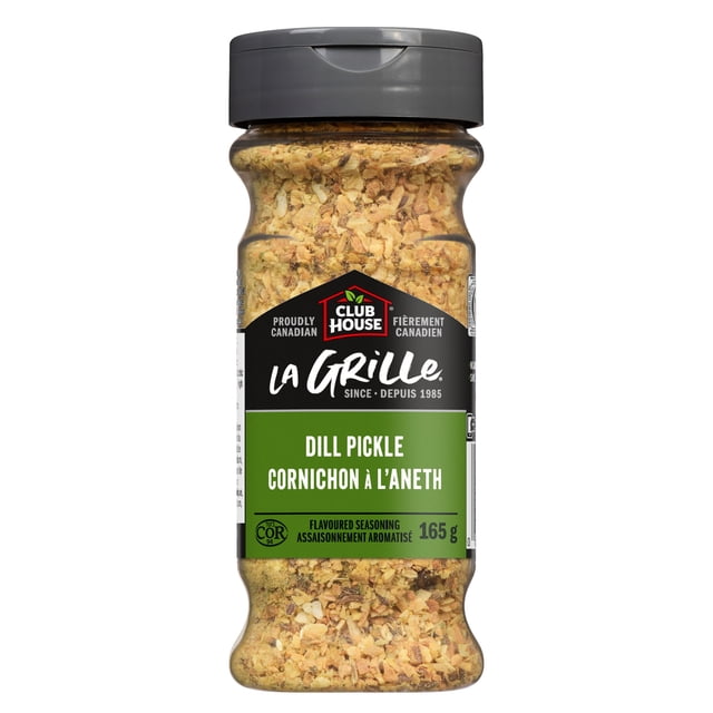 Club House La Grille Dill Pickle Seasoning front-facing jar showing pale green and white granular seasoning with visible herb flecks and a label reading Club House La Grille; shown on a kitchen surface, suitable for seasoning fries, popcorn or marinades as a zesty dill seasoning blend.