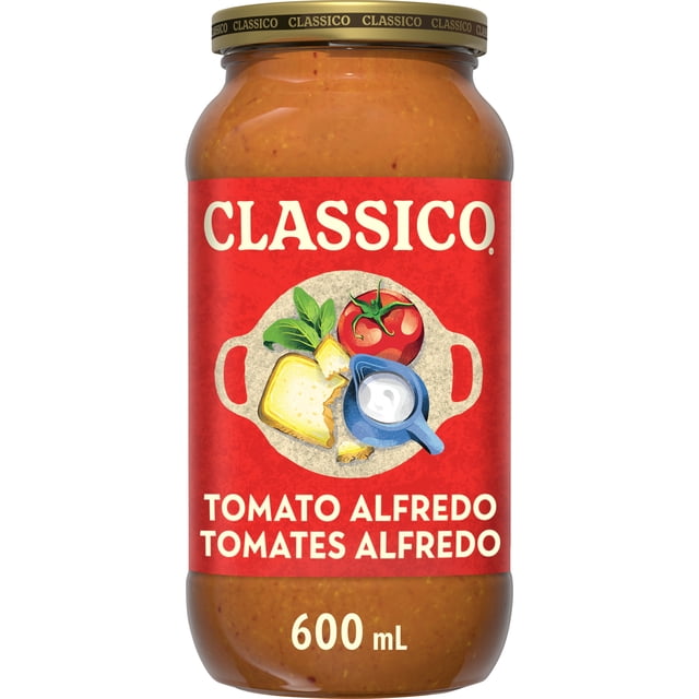 Classico Sauce pour Pâtes à la Tomate Alfredo dans un Pot en Verre de 600 ml avec une Étiquette Rouge Présentant des illustrations de Tomate, Fromage, Crème et Basilic, Mettant en Valeur Sa Saveur Crémeuse de Tomate d'Inspiration Italienne, Idéale pour les Plats de Pâtes, la Lasagne et comme Sauce à Trempette.