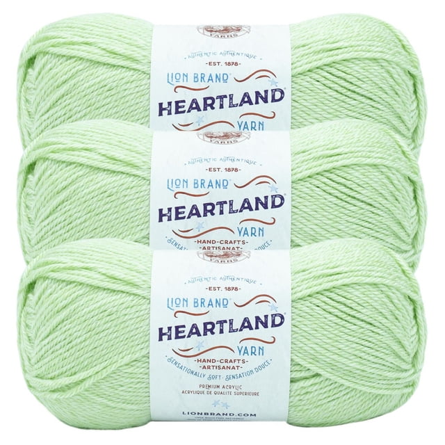 Lion Brand Yarn Heartland Yarn 3Pack in light green, worsted weight acrylic yarn skeins with white labels displaying brand and product details, machine washable and durable, suitable for knitting, crochet, and crafting projects.