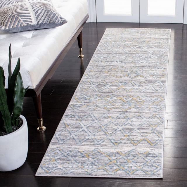 Safavieh Lagoon Zoja Distressed Trellis Area Rug 2'2"x8' runner featuring a geometric trellis pattern in soft blue, grey, and yellow tones with a distressed textured finish, made of plush synthetic yarns, displayed on dark hardwood flooring beside a white upholstered bench and a potted snake plant, ideal for hallways or entryways.
