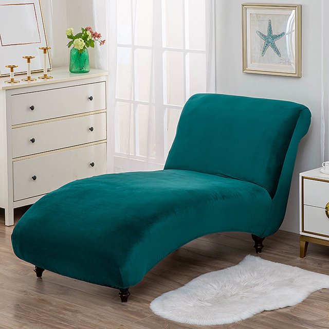 Machine Washable Cove Polyester Aesthetic Decor Non-Slip Furniture Green chaise cover shown on a curved chaise lounge in a living room. Made of durable, wrinkle-free polyester fabric, it offers a snug fit with elastic edges and buckles, suitable for seat widths of 31 to 39 inches and lengths of 47 to 63 inches. The vibrant green colour enhances the room's decor, including a white dresser, floral vase, and framed artwork. Ideal for protecting furniture from spills and wear, it can also be used to refresh the look of older furniture.