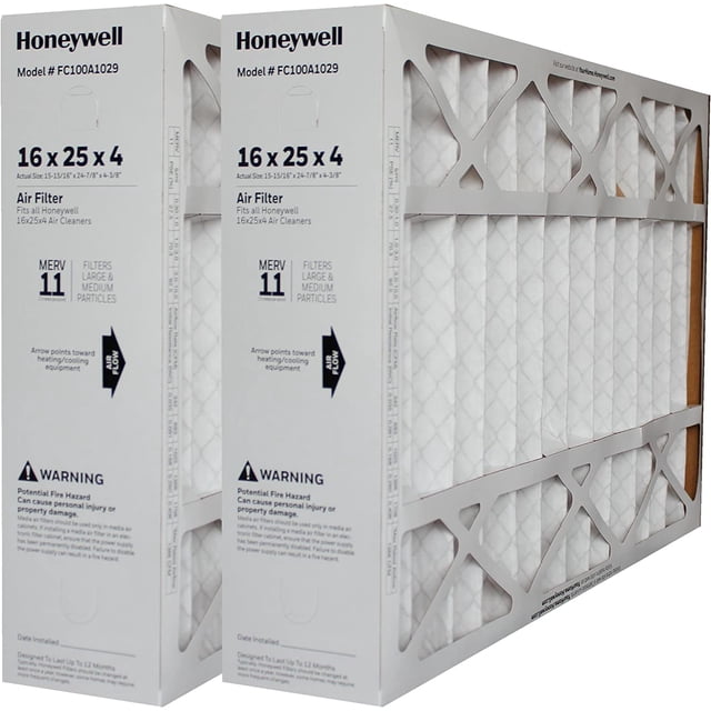 Honeywell Home FC100A1029 16x25x4 air filters, pack of 2, featuring a MERV 11 rating for superior filtration. Each filter measures 15-15/16 inches by 24-7/8 inches by 4-3/8 inches and is designed to capture microscopic particles like dust and smoke, as well as larger contaminants such as mold spores and pet dander. These filters last up to four times longer than standard one-inch filters, requiring replacement every 6-12 months. The image shows two filters in their packaging with clear labeling and specifications.