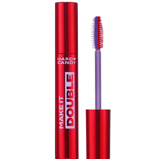 Hard Candy Make It Double Volumizing Mascara in a glossy red tube with bold white and red lettering, featuring a dual-ended brush with red and purple bristles for volumizing and lengthening lashes with a long-lasting formula.