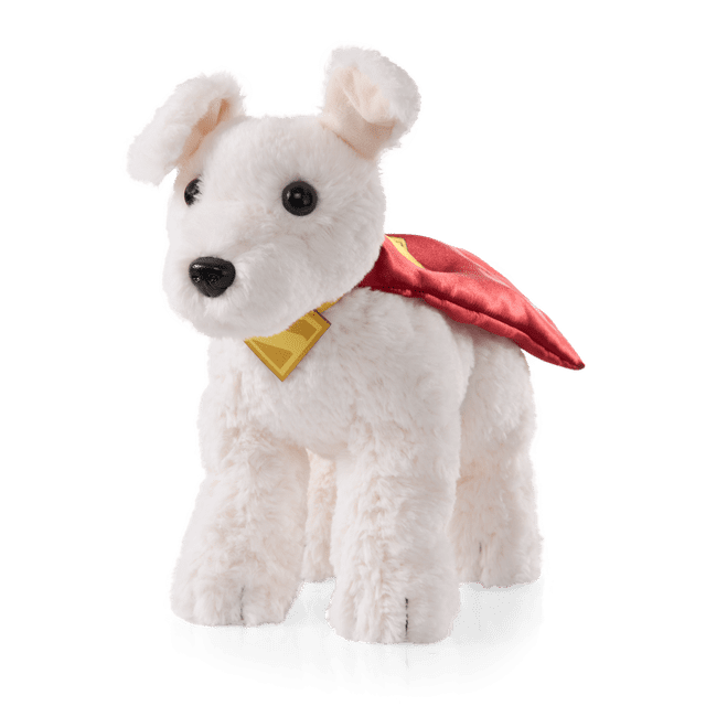 The Noble Collection Superman - Krypto the Superdog Plush, a white plush dog with embroidered paws, a red cape, and a yellow House of El collar, measuring about 12 inches (29 cm) long and 9 inches (19 cm) tall, suitable as a soft cuddly companion and collectible for DC fans.