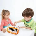 thumbnail image 4 of Toddler Educational Keyboard Toy Animals Theme Lights Music 5 Instrument Modes Portable Mini Piano In Orange 6.3X3.9X1.18 Inches 0-3 Years Sensory Play Orange, 4 of 5