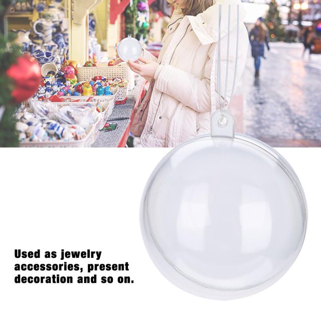 Rdeghly 20Pcs Fillable Clear Plastic Ball Wedding Christmas Decoration Ornaments, featuring 3 different sizes (5cm, 8cm, 10cm). Made from eco-friendly PS plastic, these clear, fillable balls can be separated into two parts for easy opening and closing. Suitable for Christmas tree decorations, weddings, jewelry accessories, and gift presentations. The image shows a clear plastic ball with a ribbon, displayed in a festive market setting.