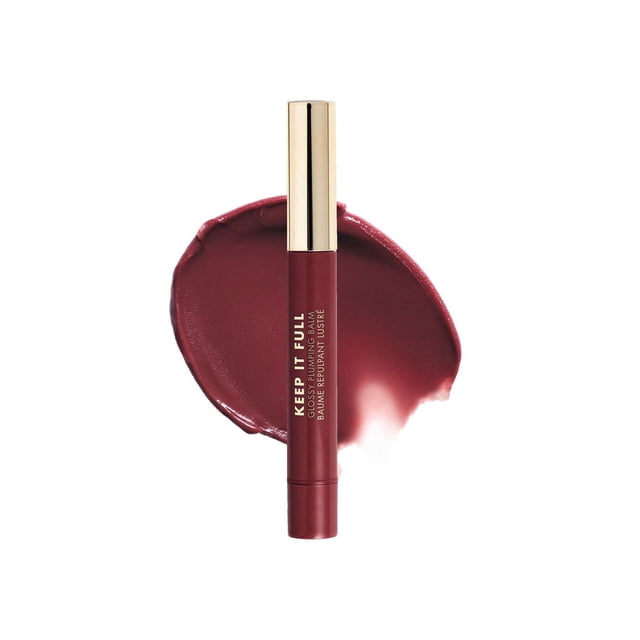 Milani Keep It Full Glossy Plumping Balm in a deep berry shade with a gold cap, shown upright on a matching glossy lip balm smear, providing a hydrating lip plumper that enhances shine, volume, and comfort.