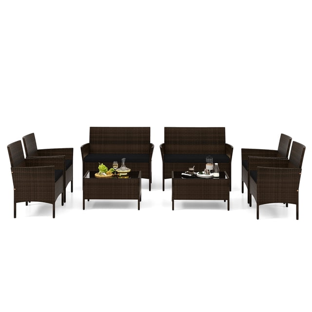 Gymax Ensemble de Conversation en Rotin pour Patio de 8 Pcs avec Coussins en Rotin PE Brun Mélangé et Noir. Comprend 2 Causeuses, 4 Chaises et 2 tables Basses avec Dessus en Verre Trempé. Accoudoirs et Dossiers Ergonomiques Assurent le Confort, Tandis Que le Cadre Métallique Robuste Offre une Durabilité. Parfait pour les Installations de Meubles en Osier d'Extérieur dans les Cours Arrière Ou les Refuges au Bord de la Piscine.