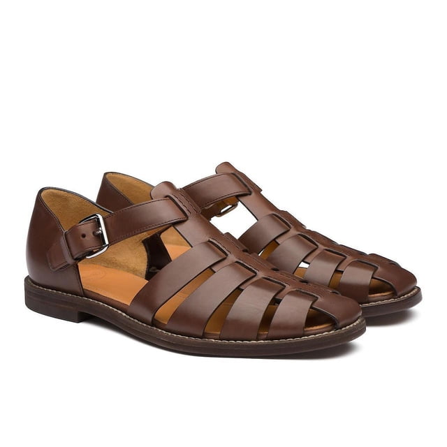 Stay Comfortable And Protected Men's Closed Toe Sport Sandals handcrafted in leather, featuring a durable brown design with a closed-toe structure and adjustable buckle strap. These fisherman sandals include a honeycomb insole and hollow openings for breathability and sweat absorption, while the TPR sole ensures anti-slip performance. Ideal summer loafers for various surfaces like beaches, mud roads, and indoor floors.