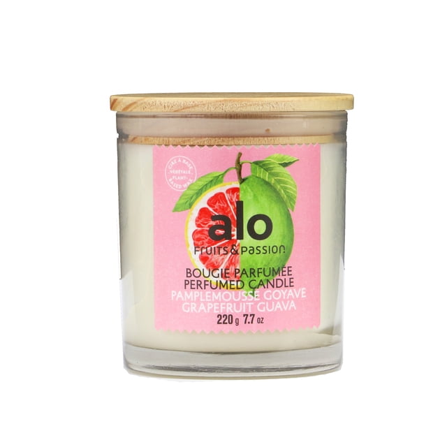 Fruits & Passion Alo Grapefruit Guava Perfumed Candle, 7.7 ounces, in a clear glass jar with a wooden lid. The label showcases grapefruit and guava illustrations, emphasizing the fruity scent. Handmade with plant-based wax, it provides a clean burn for up to 35 hours. The recyclable glass vase reflects eco-friendly design.