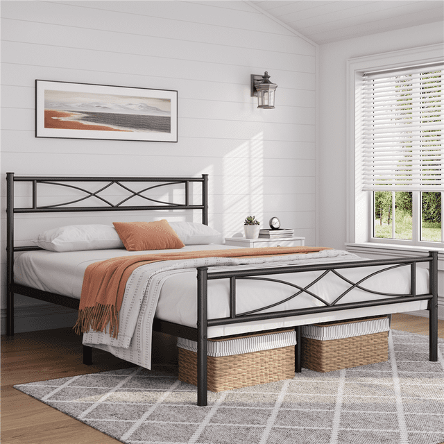 Yaheetech Simple Metal Platform Bed with Curved Design, Queen, Black, displayed in a bright, minimalist bedroom. The durable black metal frame features a curved headboard and footboard with artistic weaves, adding elegance and protection. Standing 13 inches off the floor, the platform bed offers ample under-bed storage for baskets and other items. Ideal for latex, memory foam, or spring mattresses, it eliminates the need for a box spring.