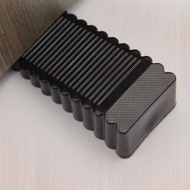 Dvkptbk Door Stopper Household Door Suction Card in black, crafted from durable silica gel. Designed with ribbed texture and double-sided functionality to fit various door gaps. Ideal for windproof door fixation, furniture protection, and preventing wall collisions. Suitable for use in dorms, RVs, and home offices.